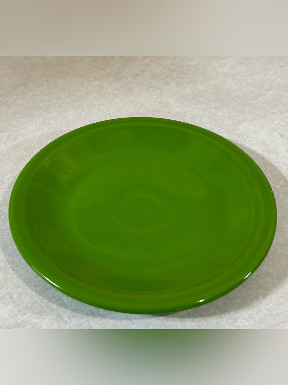 One 7” Fiestaware side plate in bright green